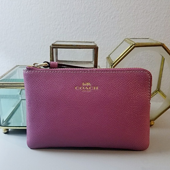 Coach Handbags - COACH pink wristlet